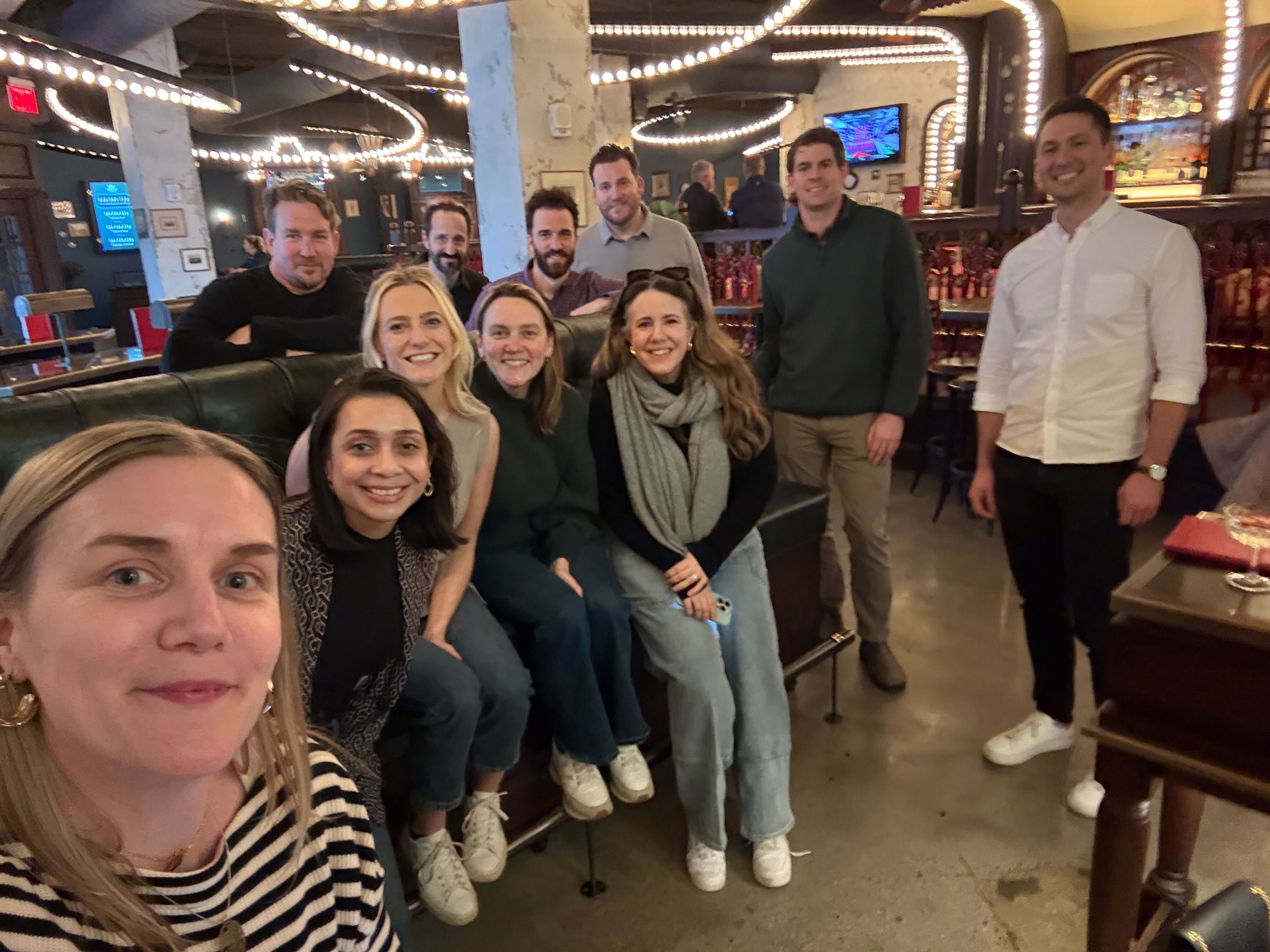 Noda team gathered at a bar